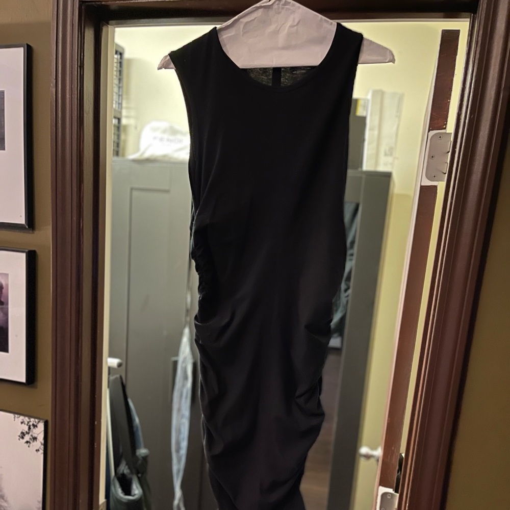 Little Black dress gathered on the side perfect for any occasion Size L